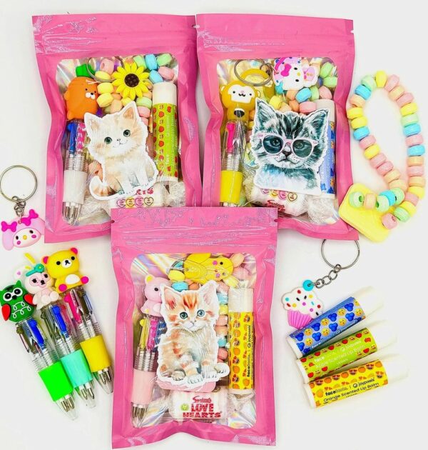 Girls Cute Cat Pink Filled Party Bag comes pre-filled with a delightful assortment lip gloss, stickers, keyring and much more.