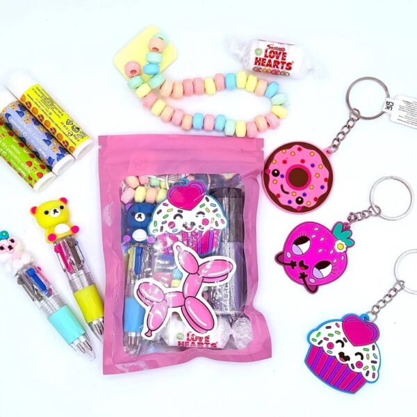 Cute Pink Pre Filled Party Bag comes pre-filled with a delightful assortment lip gloss, stickers, keyring and much more.