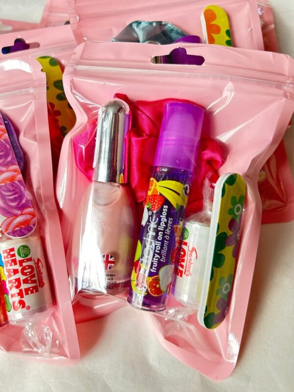 Girls Pre Filled Pamper Treat Pack comes pre-filled with a variety of lip gloss, nail polish, and other delightful goodies that make for perfect birthday treats.