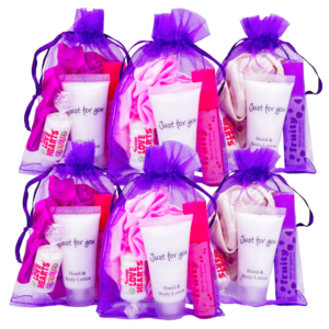 Purple Pamper Scrunchies Party Bag come pre-filled with a variety of lip gloss, nail polish, and other delightful goodies that make for perfect birthday treats.