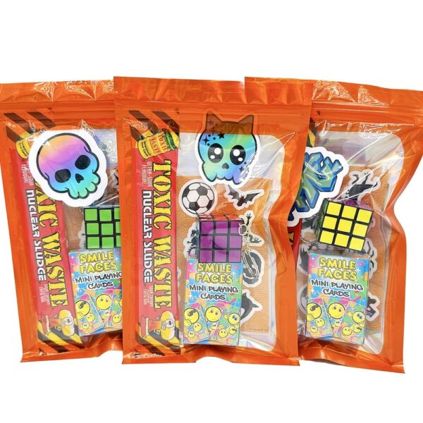 Older Boys Pre Filled Party Pack in orange comes pre-filled with a delightful assortment of sticker, playing cards, bouncy ball, vegan sweets and much more.