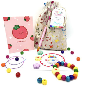 Rainbow Bracelet DIY Eco Friendly Party Bags comes Crafted from eco-friendly cotton, this stylish pre filled party bag contains wooden pencil, memo pad and DIY wooden bracelet kit keeping them occupied.