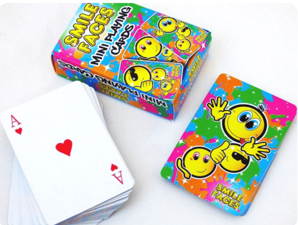 Smile Faces Playing Cards are mini playing cards in emoji design. Individual cards are printed with fun smiley faces on the back and standard playing card suits on the front.