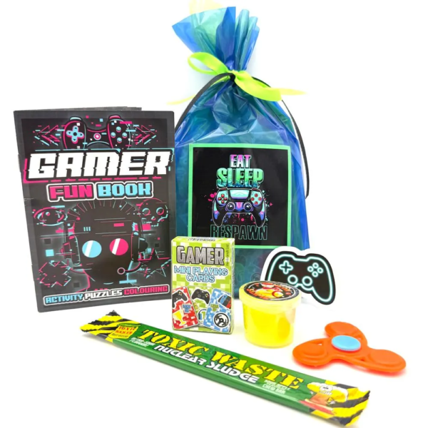 Video Gamer Respawn Party Bag are Crafted with care, each bag is presented in a double-layered green and blue cellophane gift bag, with a satin black and neon ribbon for an eye-catching finish. We also include a gaming sticker reading, "Thank you for playing " gaming console sticker on every bag, adding a personal touch to your event with matching ribbon.